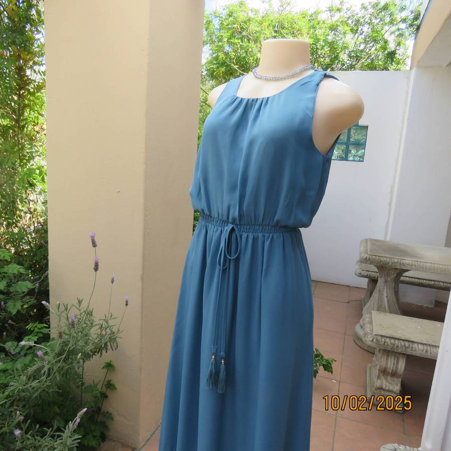 Teal blue maxi sheer fully lined dress with elasticated waist. Size 34