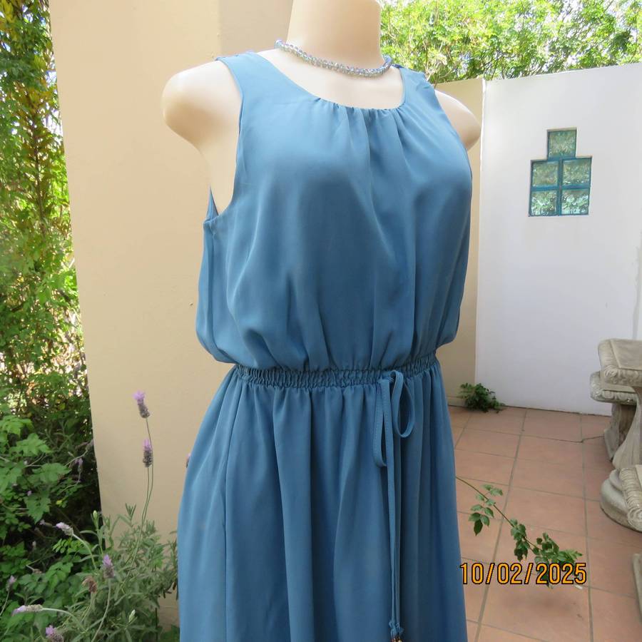 Teal blue maxi sheer fully lined dress with elasticated waist. Size 34