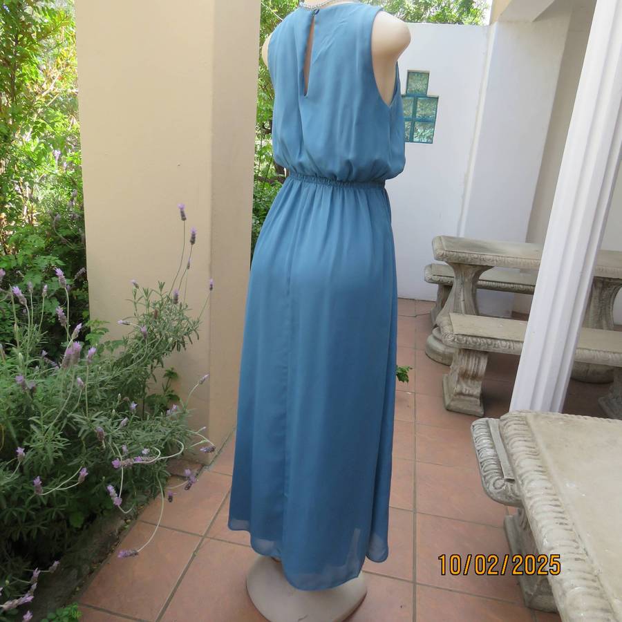 Teal blue maxi sheer fully lined dress with elasticated waist. Size 34