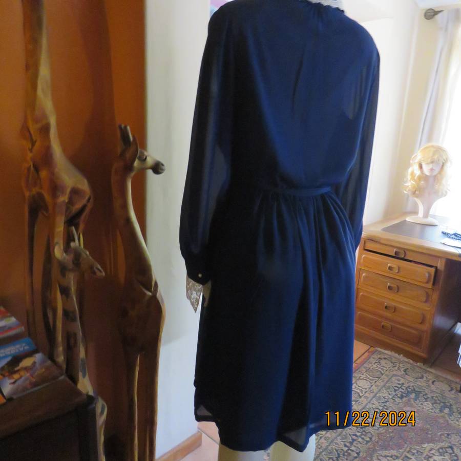 Amazing navy SHUBETTE of LONDON vintage long sleeves sheer polyester dress. Size 36.Lined.Cream lace
