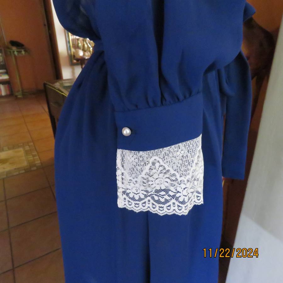 Amazing navy SHUBETTE of LONDON vintage long sleeves sheer polyester dress. Size 36.Lined.Cream lace