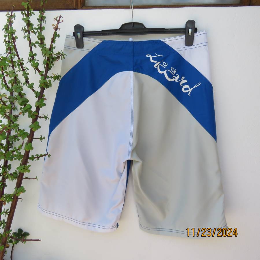 LIZZARD best quality blue and grey 100% nylon boardshorts. Size pocket.Plastic badge. Size 34.