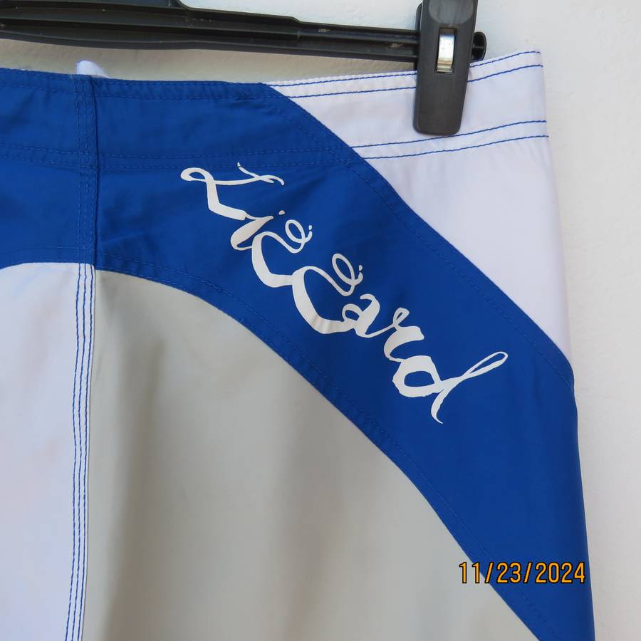 LIZZARD best quality blue and grey 100% nylon boardshorts. Size pocket.Plastic badge. Size 34.