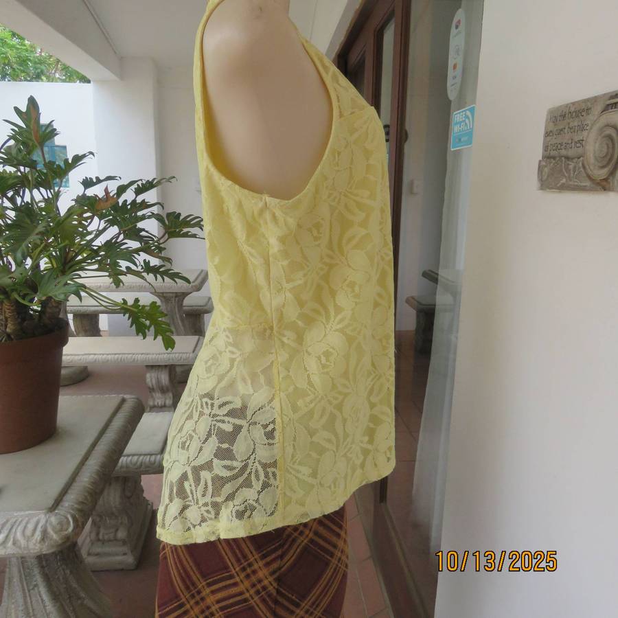 Lemon yellow stretch lace polyester partly lined sleeveless top. Size 44