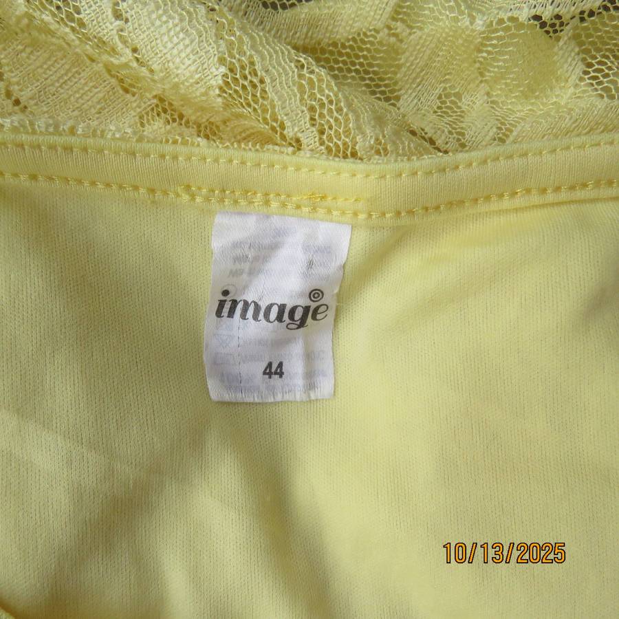 Lemon yellow stretch lace polyester partly lined sleeveless top. Size 44