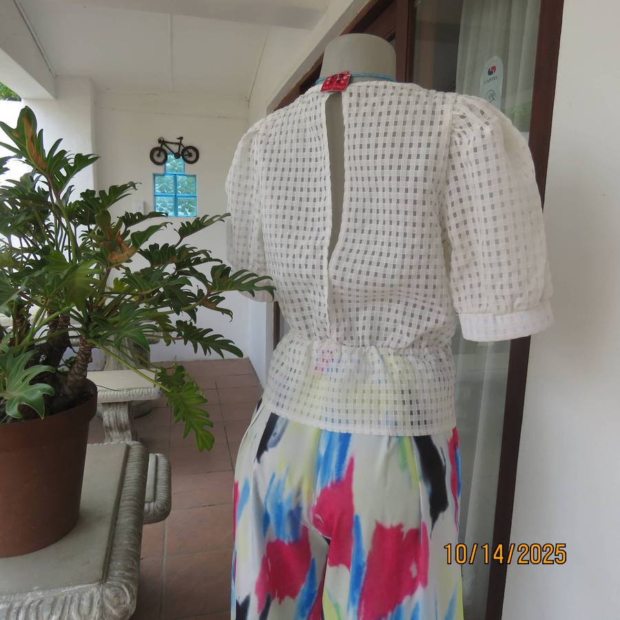 MISS L white check opaque top with front lining. Puffed short sleeves. Size 36