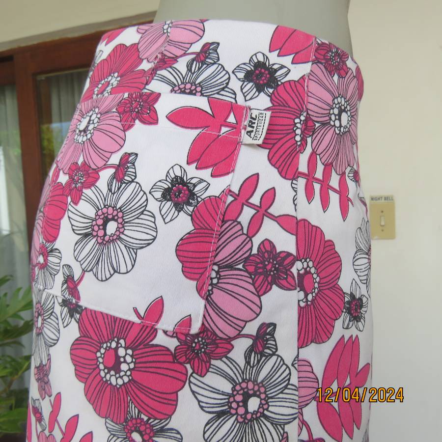 High quality heavy stretch white cotton-pink floral skirt. Size 36 by ARC Sportswear.With shorts.