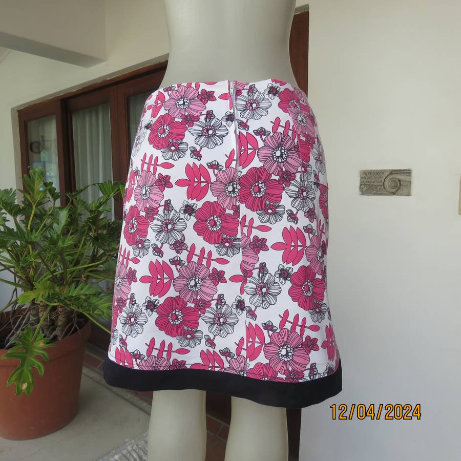 High quality heavy stretch white cotton-pink floral skirt. Size 36 by ARC Sportswear.With shorts.