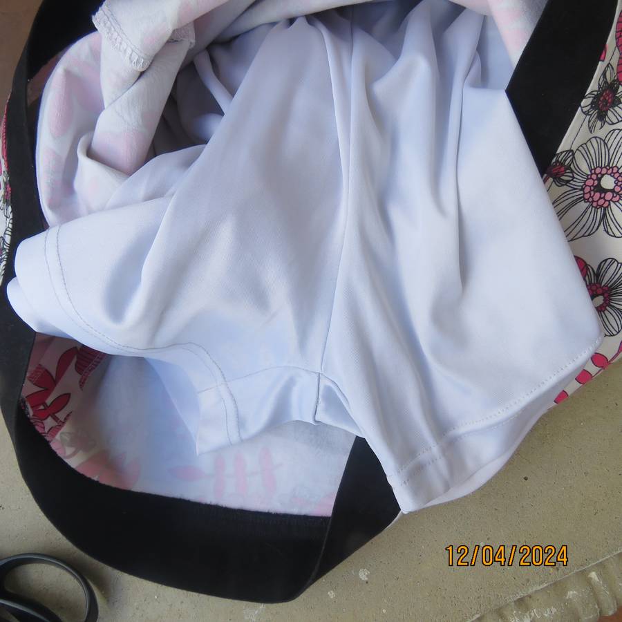 High quality heavy stretch white cotton-pink floral skirt. Size 36 by ARC Sportswear.With shorts.