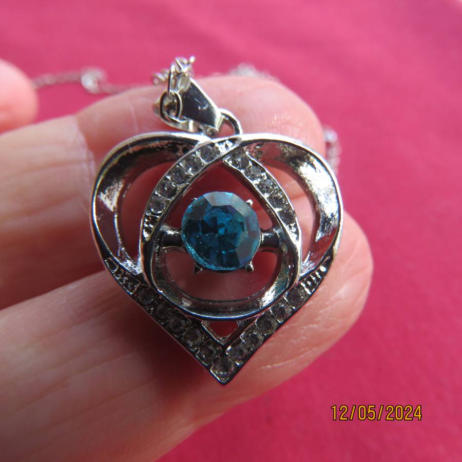 Dainty heart pendant with blue stone and faux diamonds. Silver chain. New item.