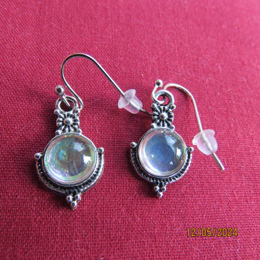Cute silvery earrings with faux opal stones. Very pretty. New item