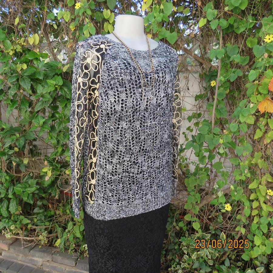 Black- silver -tiny sequins loose acrylic knit evening long sleeve top. Gold cord decor. Size 38