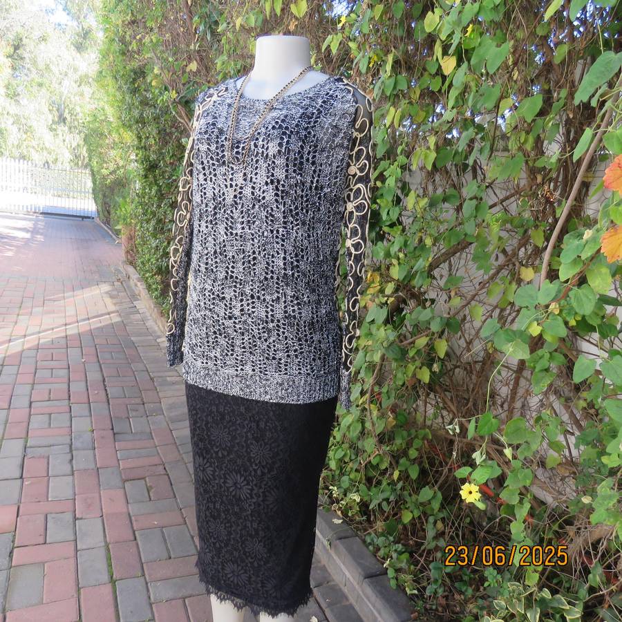 Black- silver -tiny sequins loose acrylic knit evening long sleeve top. Gold cord decor. Size 38