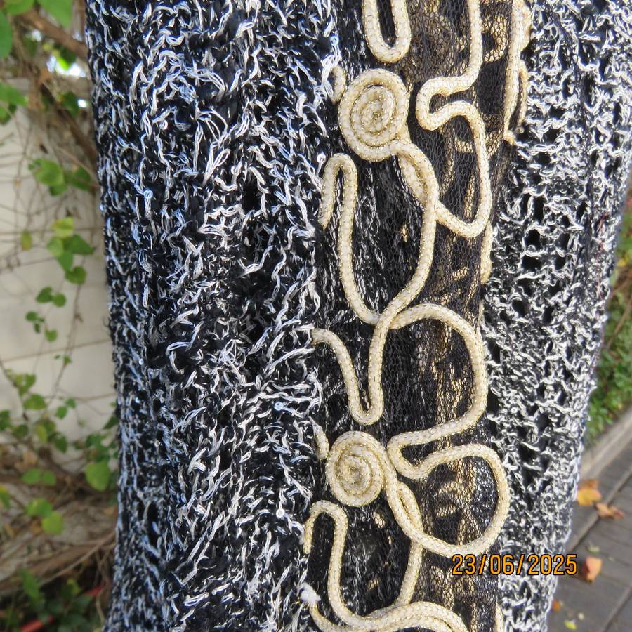 Black- silver -tiny sequins loose acrylic knit evening long sleeve top. Gold cord decor. Size 38