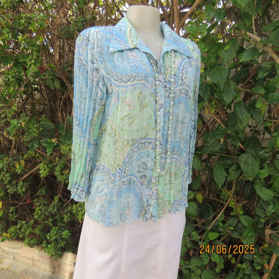 Soft blue-green permanent pleated paisley printed polyester top. Size 38.