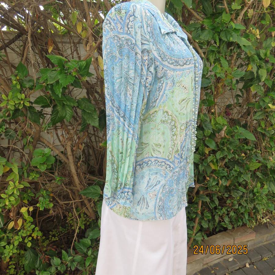 Soft blue-green permanent pleated paisley printed polyester top. Size 38.
