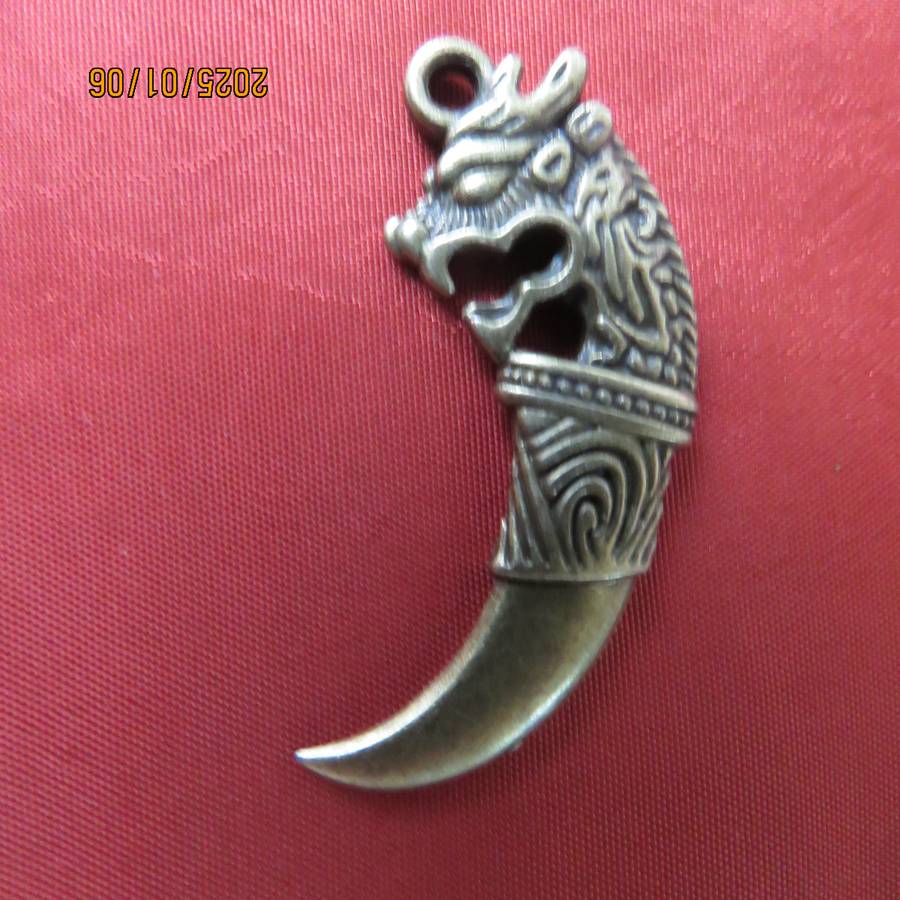 Men's brass pendant in tooth design. Length 4.2cm. Just need suitable chain. New item.