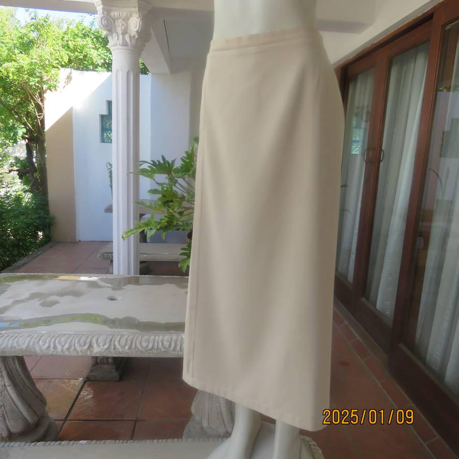 FERGIE oatmeal colour pencil skirt size 50-52. Flat front.Elasticated waist back. Front tucked seam.
