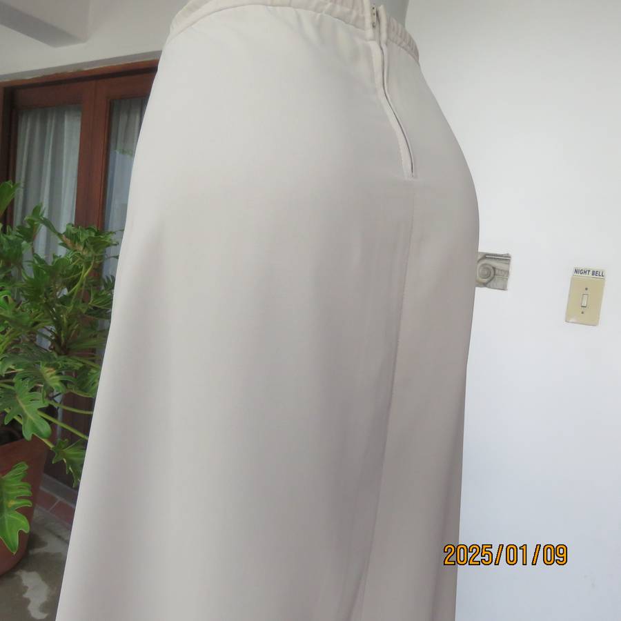FERGIE oatmeal colour pencil skirt size 50-52. Flat front.Elasticated waist back. Front tucked seam.