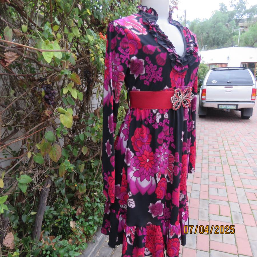 OASIS black stretch polyester with red-lilac floral print slip over long sleeve dress. Size 33