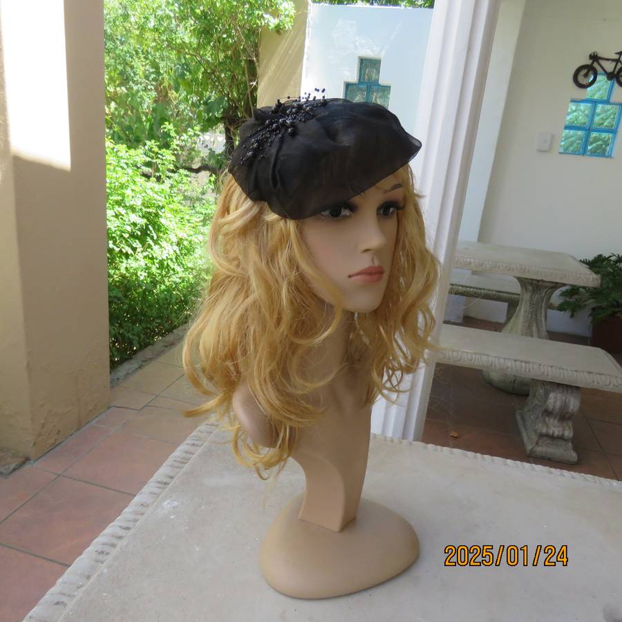 Stunning hand made black organza fascinator-hairband with bead decoration. New item.