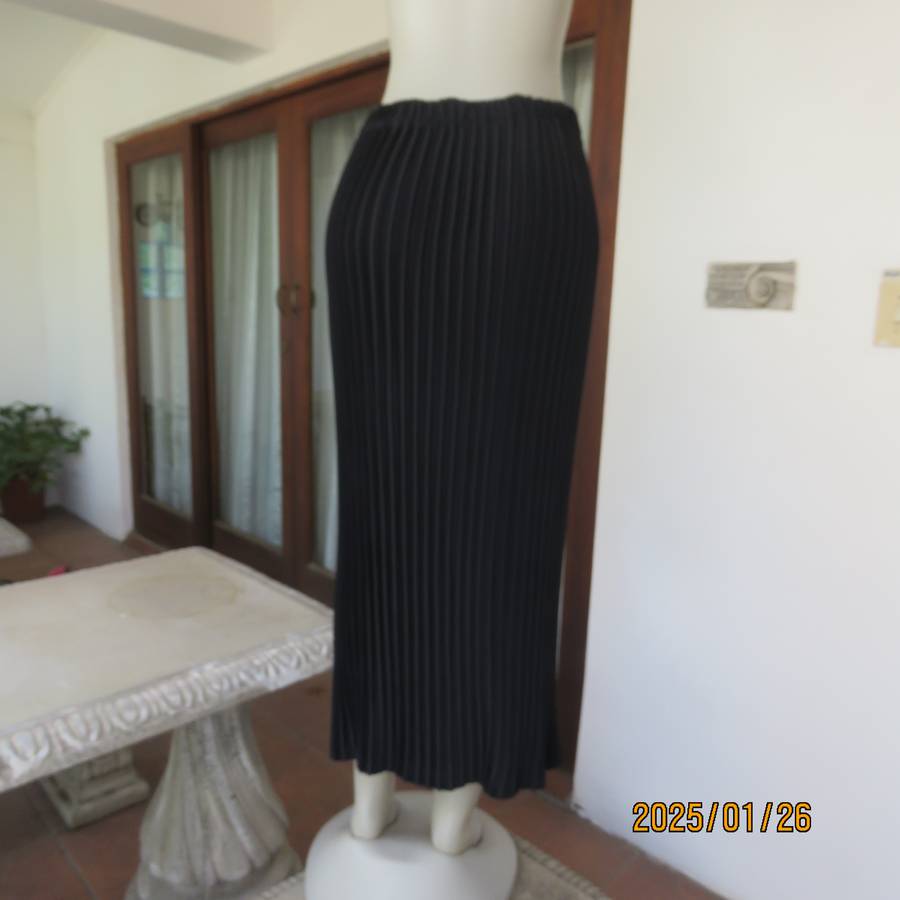CHARISMA black fine permanent pleated polyester skirt size 36 with elasticated waist. Ankle length