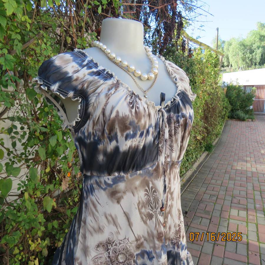 NEWS high-low empire style lined sheer polyester top in blue-cream and brown print. Size 34