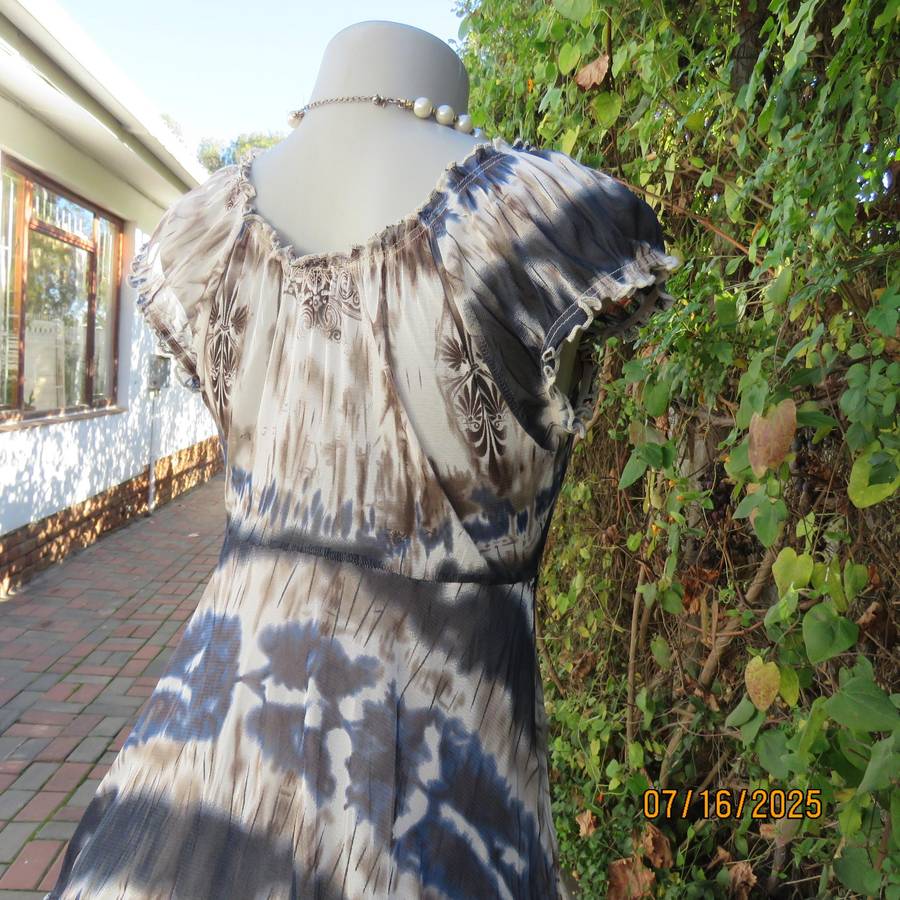 NEWS high-low empire style lined sheer polyester top in blue-cream and brown print. Size 34