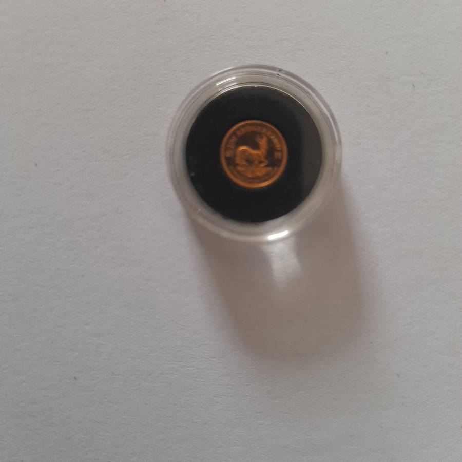 The 2018 South African 1 Rand 1/50oz Solid Gold Krugerrand coin in a capsule