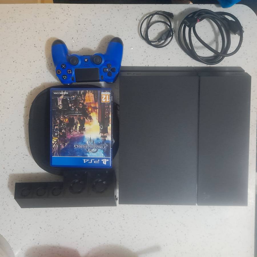 PlayStation 4 Console with 1 Controller, 2 Games, Fan, HDMI, Power Cables Bundle