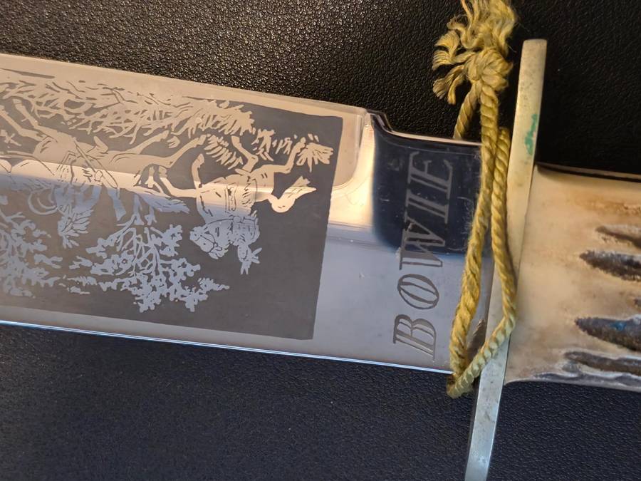 Original handmade German Solingen Inox Linder Bowie knife with etched Western/hunting scene.