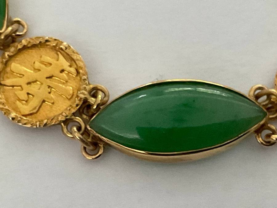A stunning Chinese antique 20K yellow gold and jade bracelet .Circa 1920