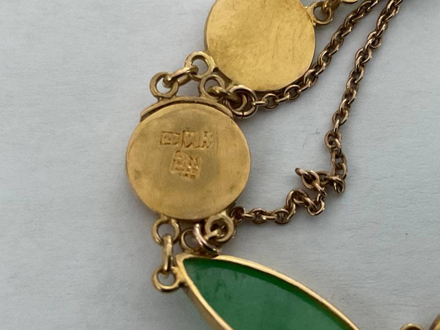 A stunning Chinese antique 20K yellow gold and jade bracelet .Circa 1920