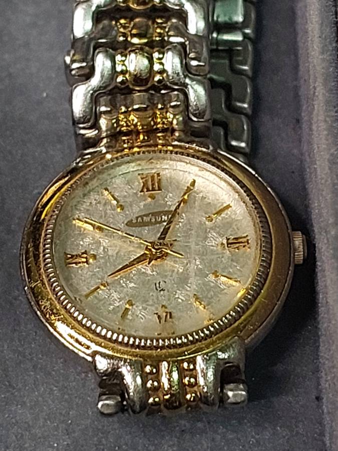 A PAIR OF QUARTZ SAMSUNG WRIST WATCHES