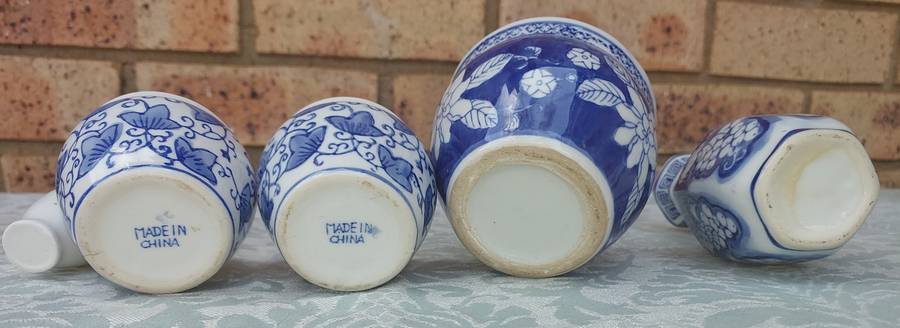 A COLLECTION OF CHINESE PORCELAIN MING STYLE MINIATURE FLOWERPOTS AND VASES