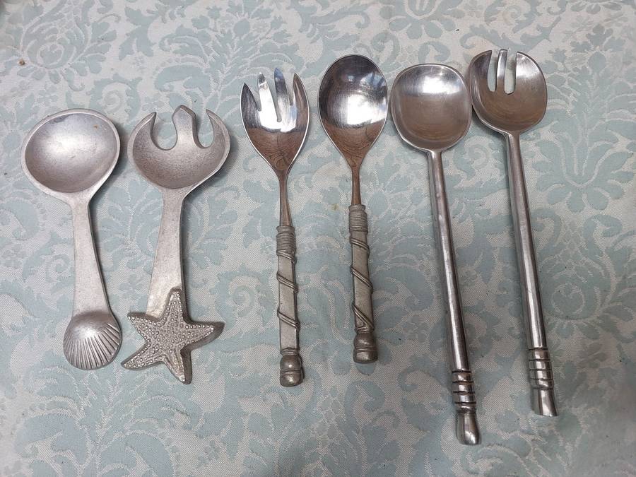 A COLLECTION OF 3 SETS OF CAROL BOYES STYLE PEWTAL SALAD LADELS SOLD AS IS
