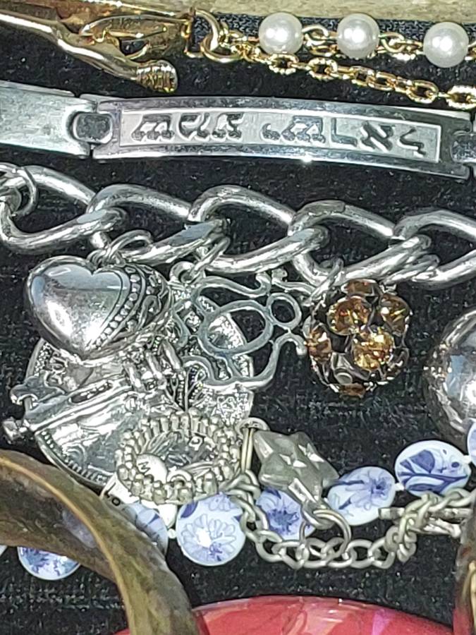 A VINTAGE JOBLOT BRACELETS AND BANGLES SOLD AS IS