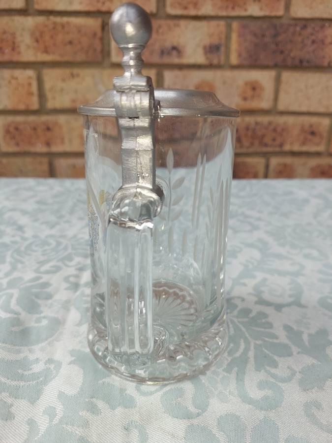 A GERMAN BEER STEIN IN MINT CONDITION SOLD AS IS R750