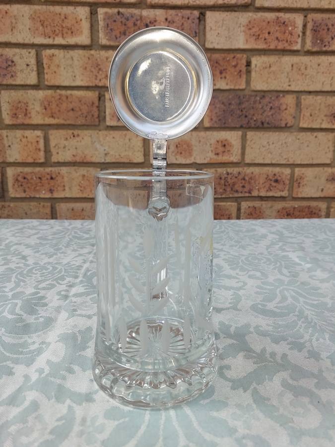 A GERMAN BEER STEIN IN MINT CONDITION SOLD AS IS R750