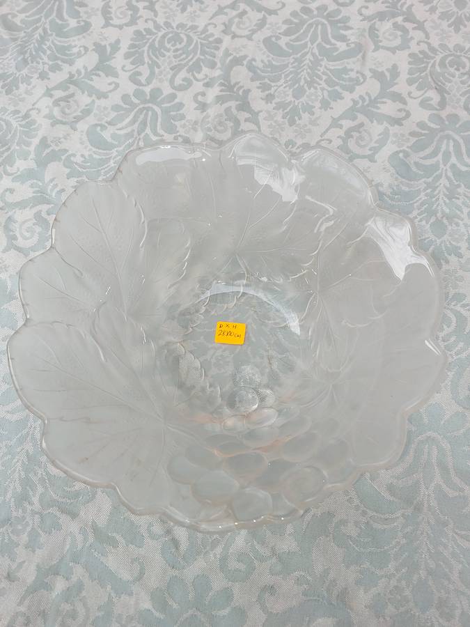 AN ART DECOR GREEN TINTED GLASS VASE SOLD AS IS
