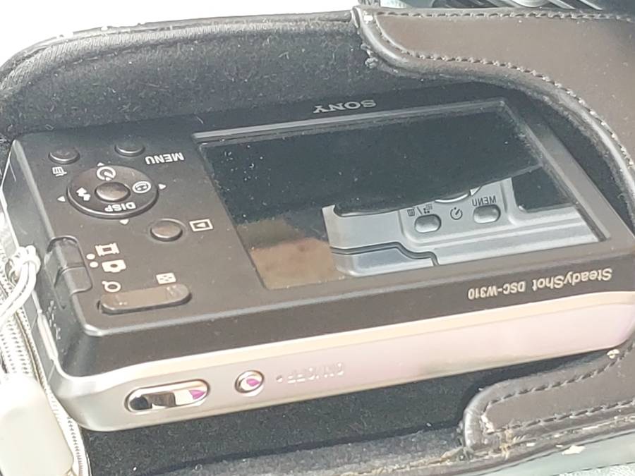 A JOBLOT POCKET CAMERAS AND A NINTENDO GAME WITH ALL THE GAMES SOLD AS IS NOT TESTED