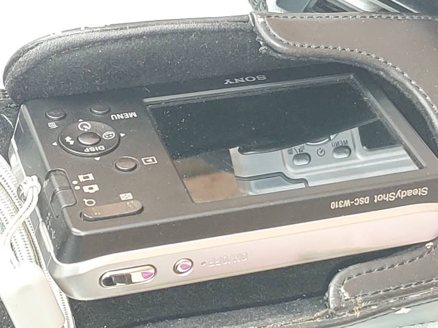 A JOBLOT POCKET CAMERAS AND A NINTENDO GAME WITH ALL THE GAMES SOLD AS IS NOT TESTED