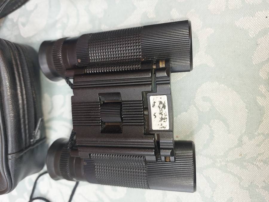 A JOBLOT COLLECTION OF POCKET BINOCULARS SOLD AS IS R450