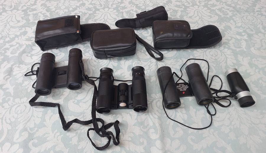 A JOBLOT COLLECTION OF POCKET BINOCULARS SOLD AS IS R450