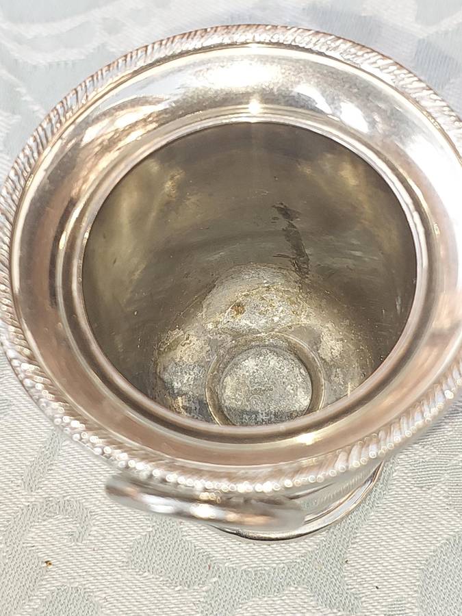 A COLLECTION OF5 LION HEAD TOOTH PIK HOLDERS SOLD AS IS SILVER PLATED