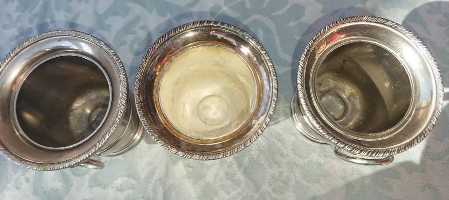 A COLLECTION OF5 LION HEAD TOOTH PIK HOLDERS SOLD AS IS SILVER PLATED