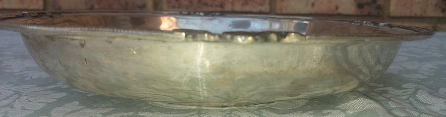 A VINTAGE VICTORIAN SILVER PLATED SERVING BOWL SOLD AS IS