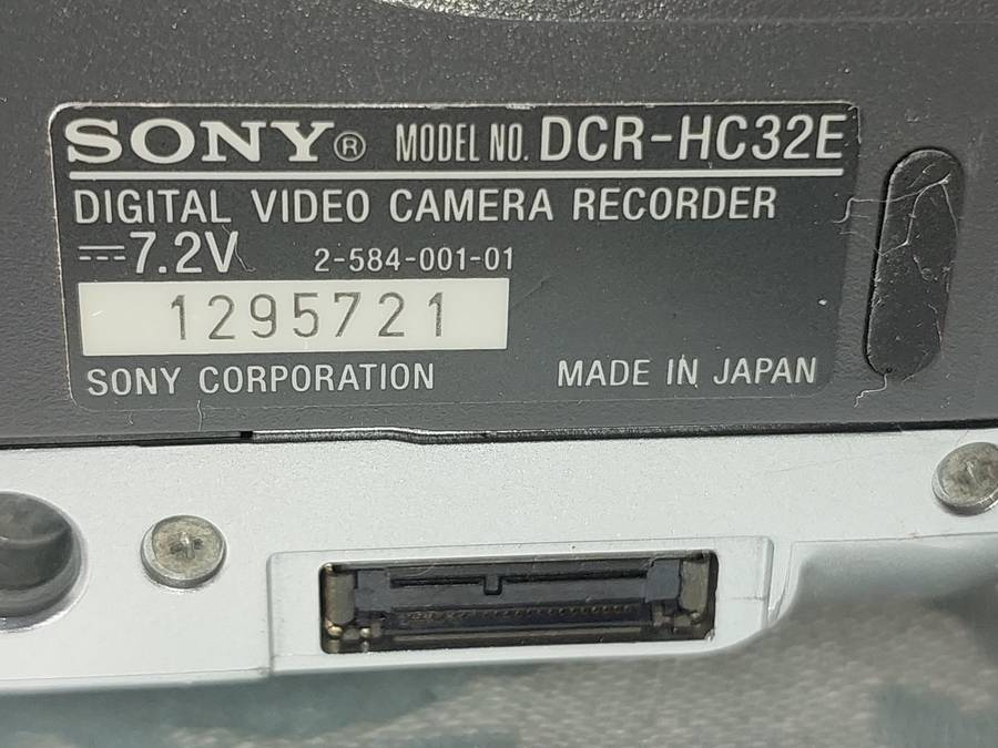 A SONY MODEL DCR-HC32E DIGITAL VIDEO CAMERA RECORDER IN WORKING ORDER WITH ALL CABLES , BATTERY AND