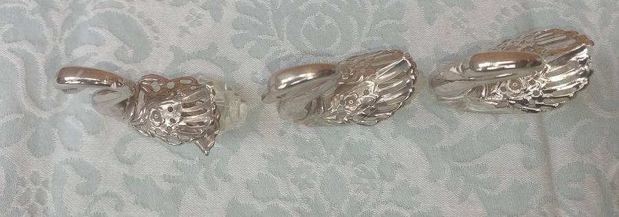 A set of 3 Swan Salt Cellars with out  Spoons Silver Plate vintage sold as is