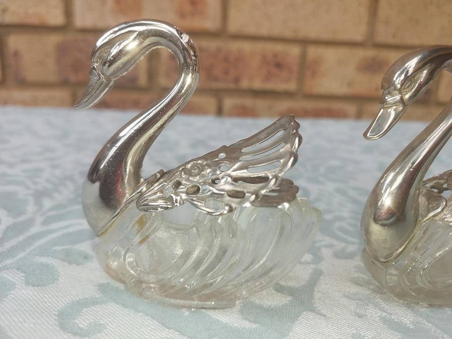 A set of 3 Swan Salt Cellars with out  Spoons Silver Plate vintage sold as is